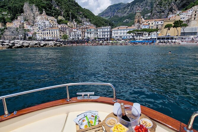 Private Boat Tour Along the Amalfi Coast from Positano - Private Gozzo boat time: the feel of this tour from Positano