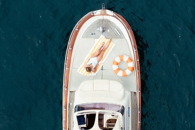 Private Boat Tour Along the Amalfi Coast from Positano - Sailing toward Amalfi: prosecco, views, and the “stop when it works” rhythm