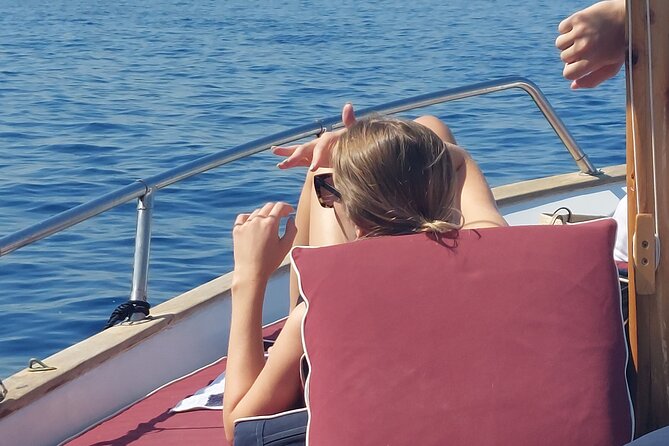 Private boat tour along the coast of Capri : 2 hours of beauty - Stop 1: Island of Capri for Faraglioni views and a swim-time break