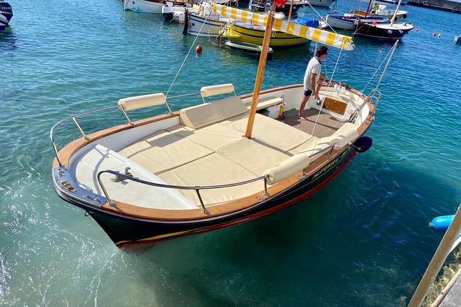 Private boat tour of Capri (relaxation tour three hours) - What you see on the island circuit: grottos, forts, and Faraglioni from close range