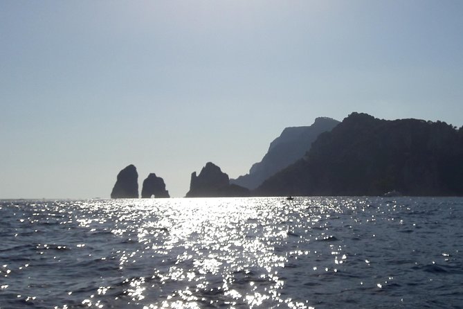 Private boat tour of the island of Capri - Private Boat Comfort: Drinks, Snacks, Towels, and On-Board Shade