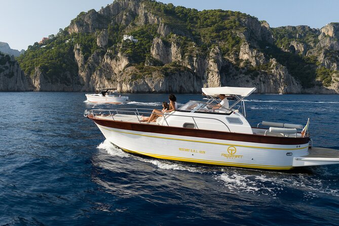 Private Boat Tour To Capri Departing From Positano - Punta Carena, Marina Piccola, and the Faraglioni postcard circuit