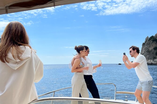 Private Boat Tour to Capri's Hidden Gems with Local Skipper - Mermaid’s Rock, Sailors’ Cave, and the Faraglioni photo pause