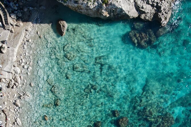 Private boat trip to Capri - Caves stop-by-stop: Sailors, Coral, and the Blue Grotto trade-off