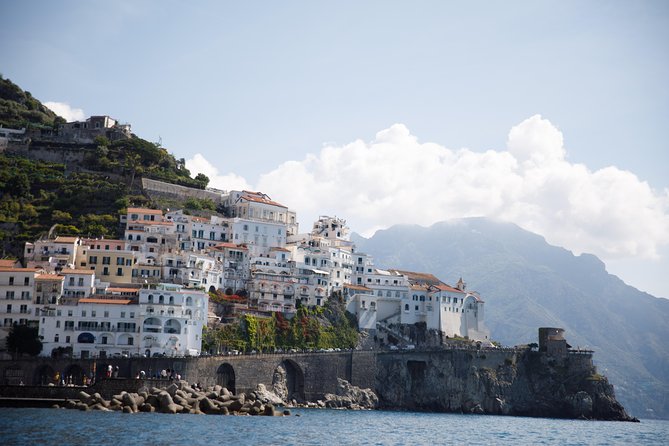 Private Capri Escape: Full-Day Boat Tour from Sorrento - Faraglioni Photo Stops and the White Grotto Moment