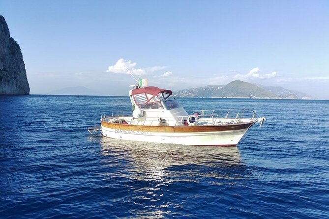 Private Tour of the Island of Capri by Boat and Visit to the Caves - Stop 2: I Faraglioni for photos, then through their enchanting arch