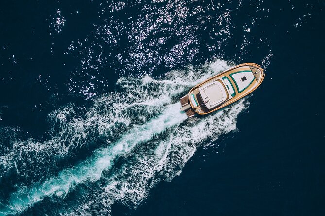 Shared boat tour to Capri from Sorrento - Capri by Boat: Grotto Stops and the Faraglioni Photo Route