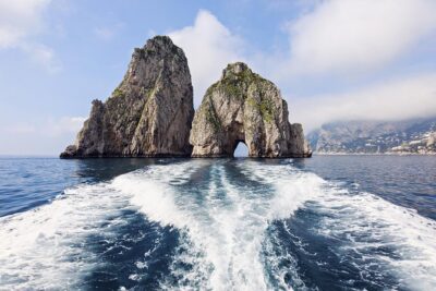 Small Group Capri Island Boat Ride with Swimming and Limoncello - Classic Sorrento boat comfort on choppy mornings