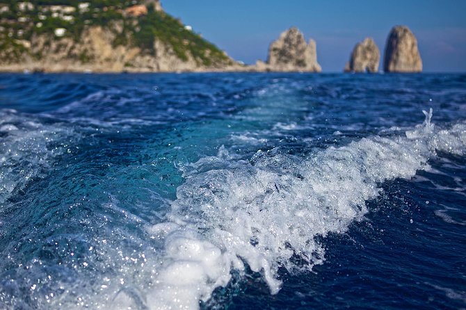 Small Group Capri Island Boat Ride with Swimming and Limoncello - Punta Carena Lighthouse and the return to Marina Grande