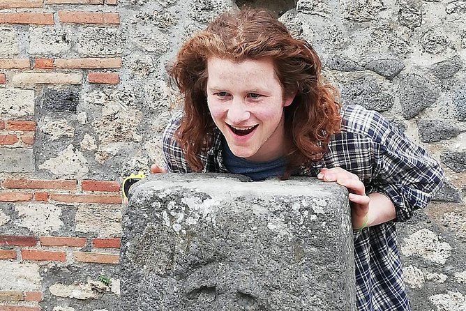 Small Group Guided Walking Tour of Ancient Pompeii Highlights - What group size feels like: pace, questions, and ear pieces