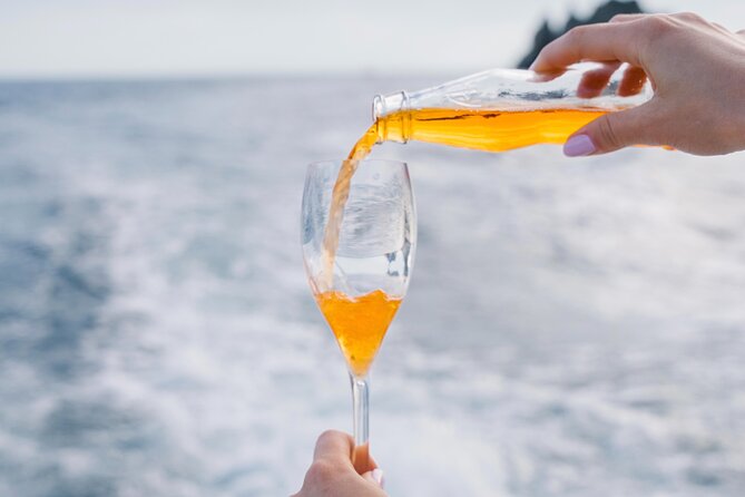 Small Group Tour in Positano by Boat at Sunset with Prosecco - Weather, seasickness, and what to bring