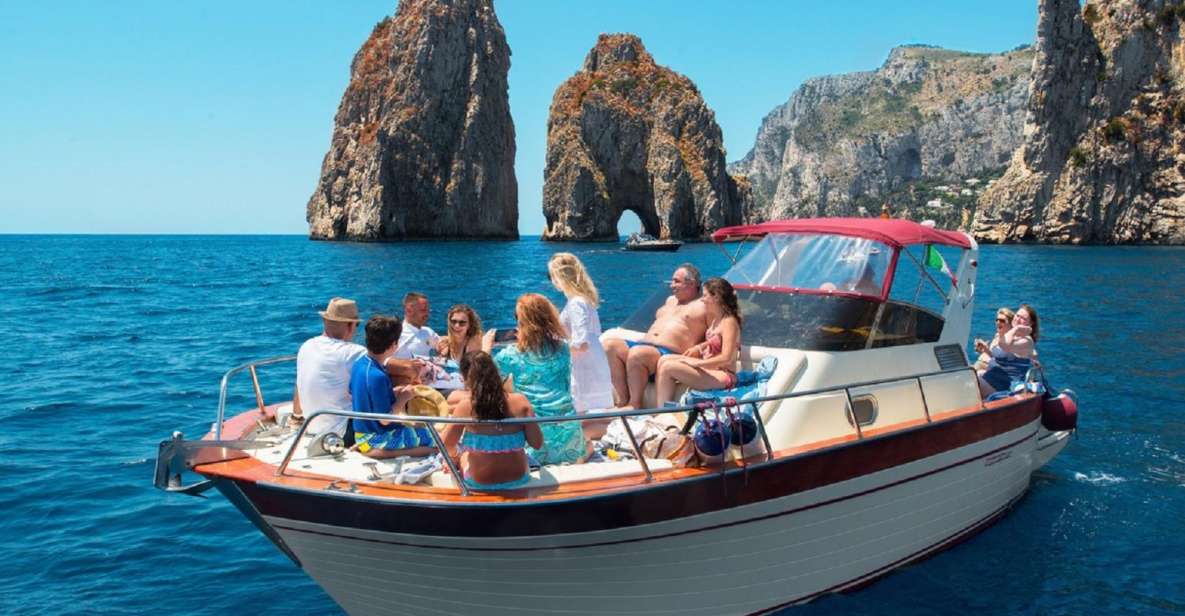 Sorrento: Capri and Blue Grotto Boat Cruise with Drinks - Capri by Boat: Faraglioni, Natural Arch, and Punta Carena