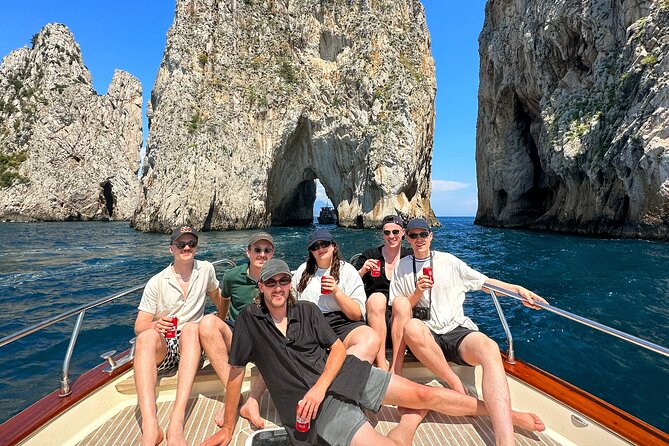 Sorrento: Capri Boat Small Group Tour Up to 8 & 4 hours ashore - Capri’s signature sea scenery: caves, stalactites, and Faraglioni from the right angle