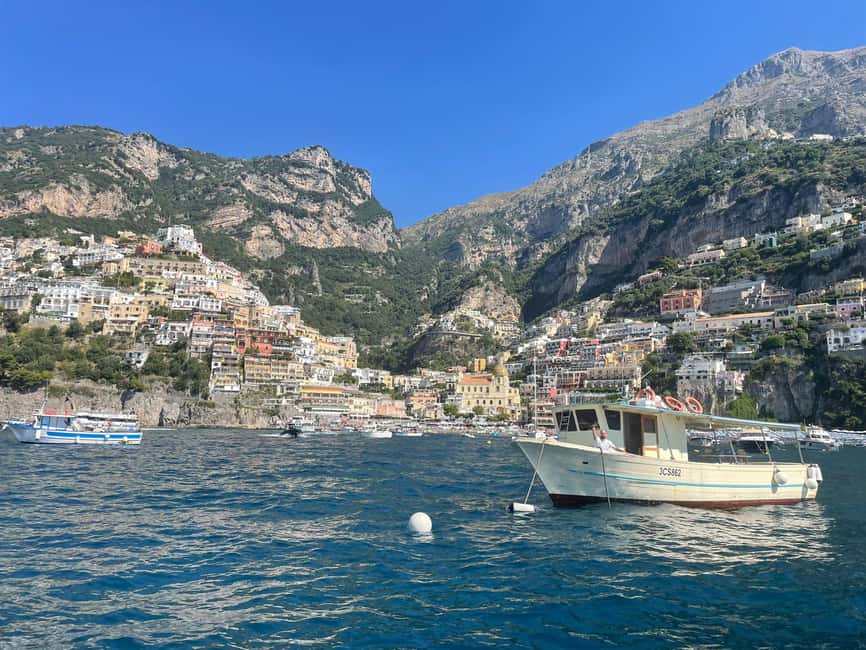 Sorrento: Swim, Dine and Toast on Sorrento Coast Sunset Tour - Dinner onboard: local dishes, Prosecco, and sweet ending