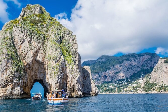 Sorrento to Capri: Small Group Boat Tour with Blue Grotto - Punta Carena Lighthouse and Faraglioni: The Coastline’s Photo Sweet Spot