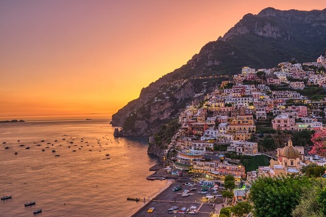 Sunset boat tour of the Amalfi Coast - Ending Between Positano and the Galli Islands: Capri in View