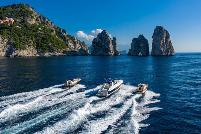The Blue Fever: Capri island day cruise - Bagni Regina Giovanna: ruins resting where the sea meets the rocks