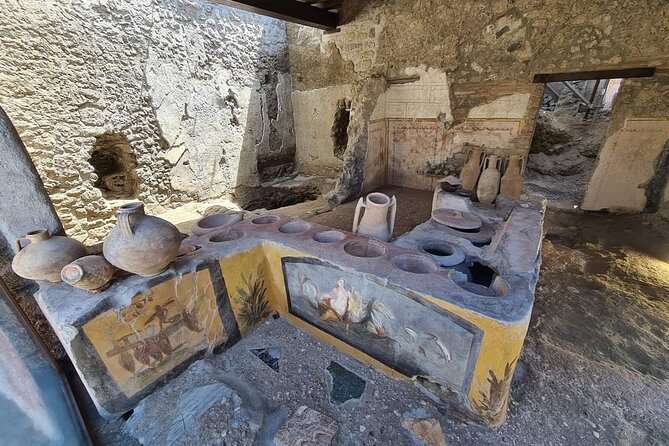 The charm of Pompeii and Herculaneum.Private Tour with Official Guide - The Pompeii map and bottled water: small perks, real payoff