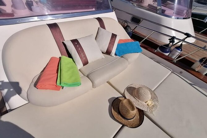 Three Hour Private Guided Tour of Capri with a luxury Gozzo cabin cruiser - Gennarino the Scugnizzo and Capri’s watchtower-era ruins